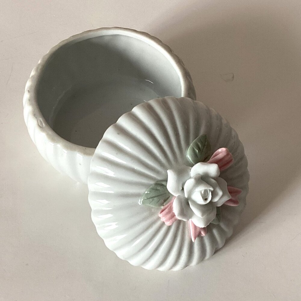 Round Jewelry Trinket Storage Box With a White Flower